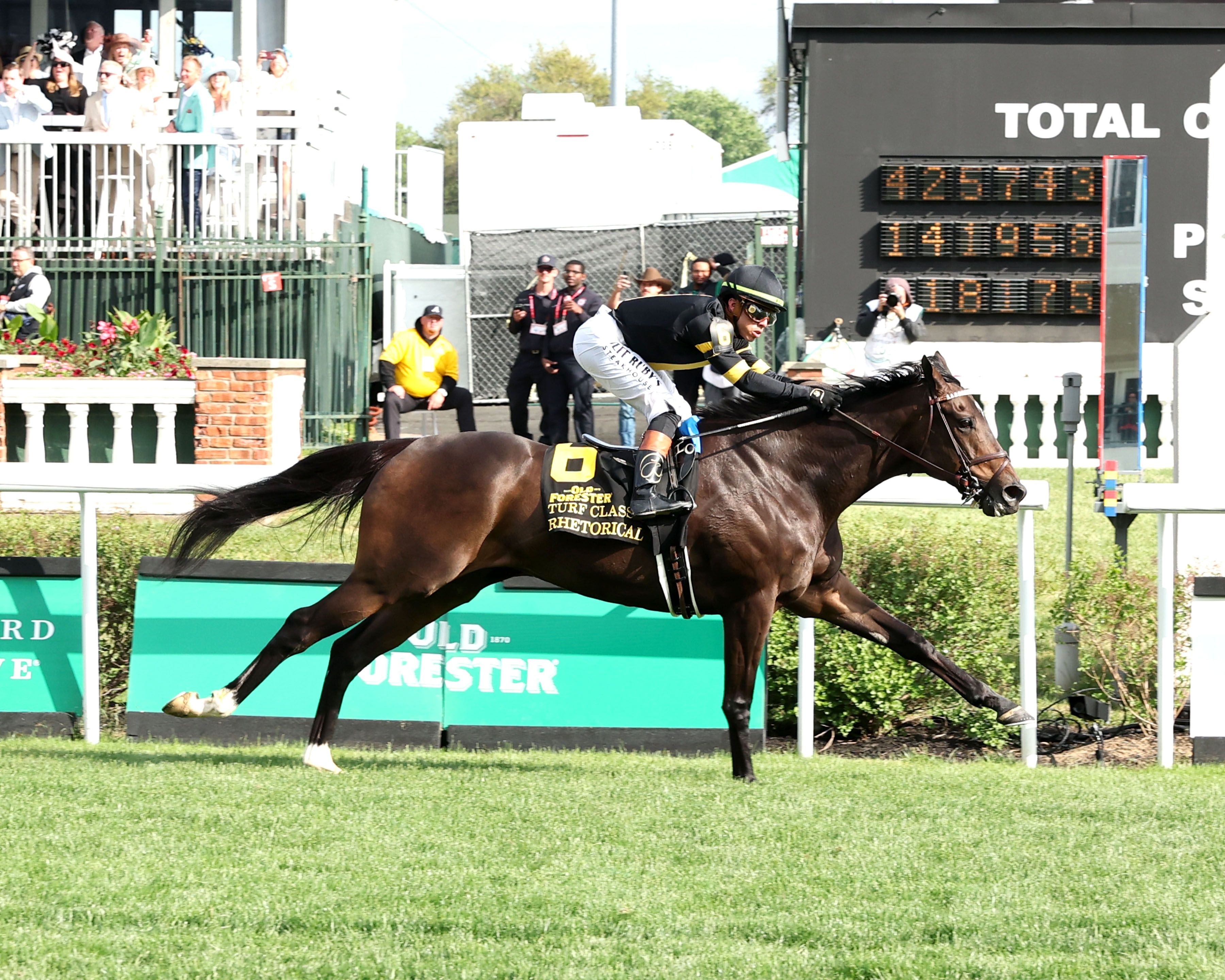 Rhetorical wires Turf Classic in stakes-record time