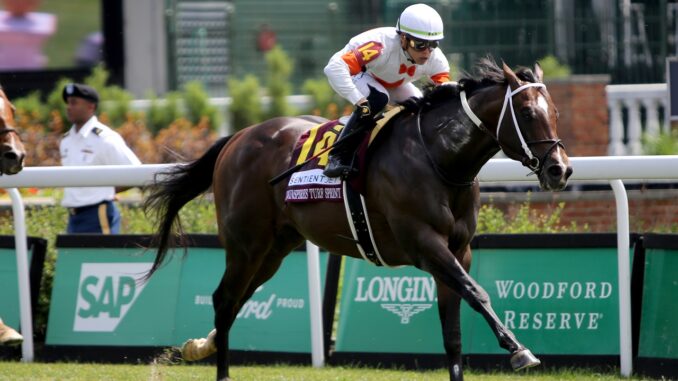 Cogburn winning the Twin Spires Turf Sprint (G2) at Churchill Downs (Photo by Horsephotos.com)