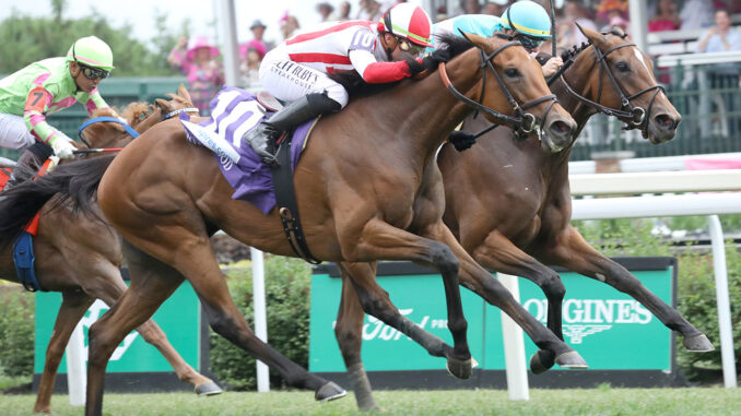 Dynamic Pricing (outside) winning the Edgewood (G2) at Churchill Downs (Photo by Horsephotos.com)