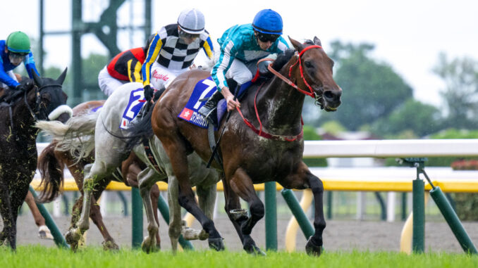 Romantic Warrior with jockey James McDonald wins the Yasuda Kinen