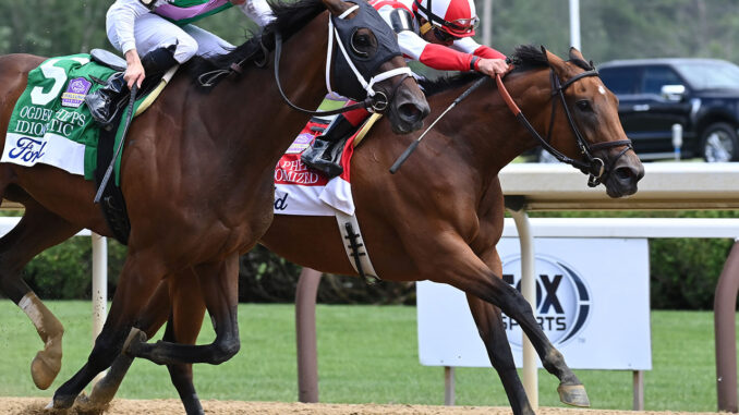 Randomized outdueling Idiomatic to win the Ogden Phipps (G1) at Saratoga (Photo by Coglianese Photos)